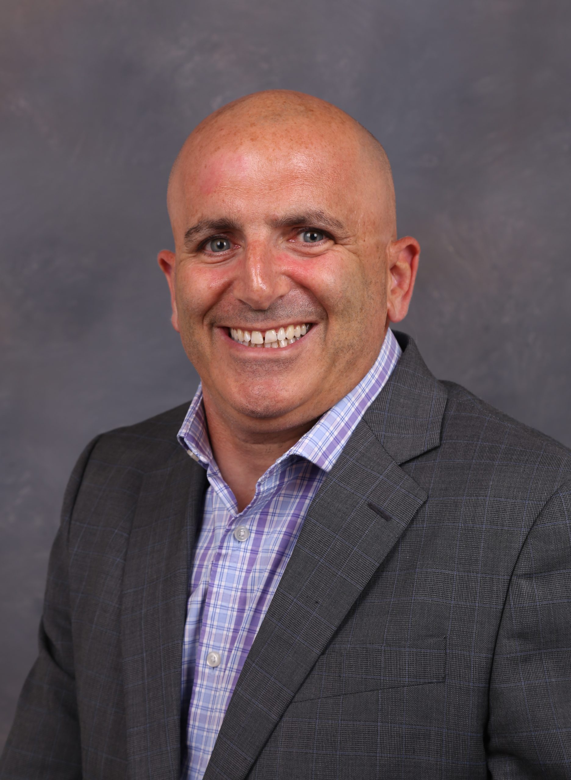 A Headshot of James Oppenheimer
